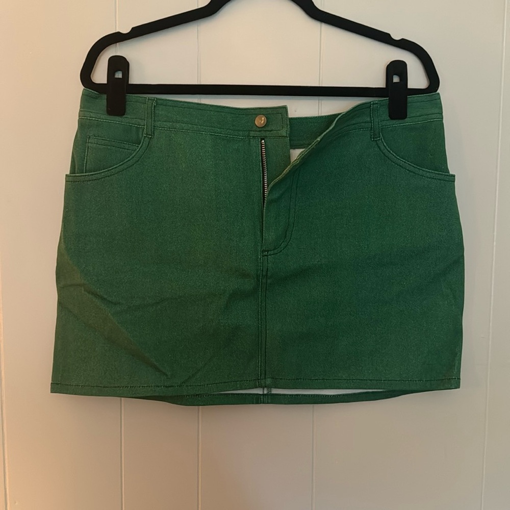green mini skirt